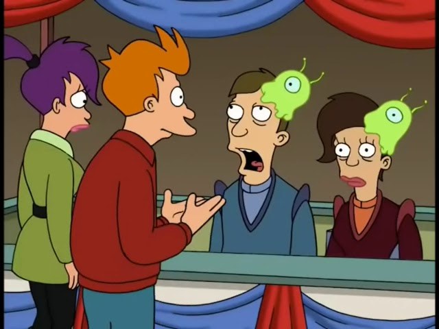 Futurama still. Fry talks to two people with green brain slugs stuck to their heads.